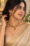 Antique Gold Kundan Necklace Set with Matching Jhumka Earrings
