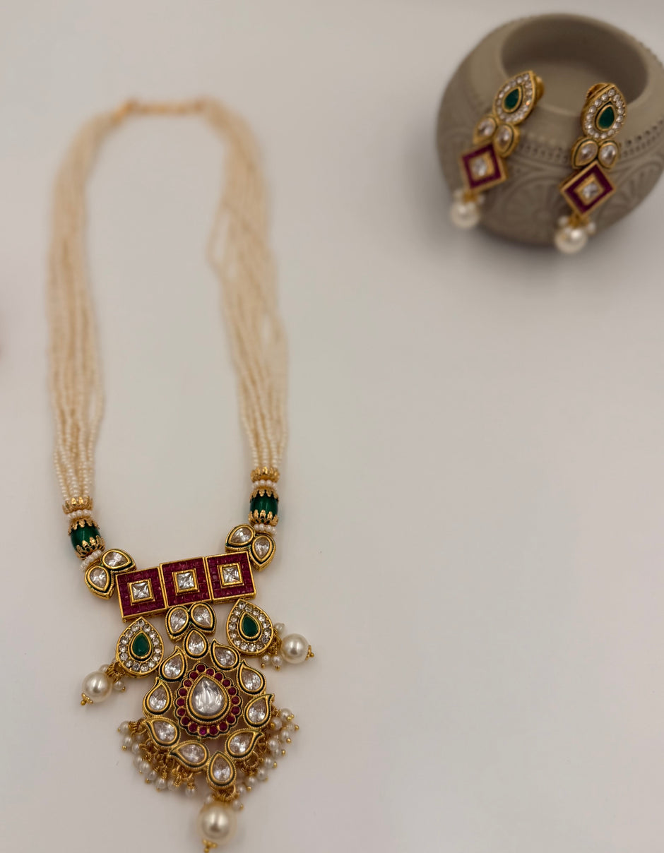 Kundan Pearl Necklace Set with Green & Ruby Stones