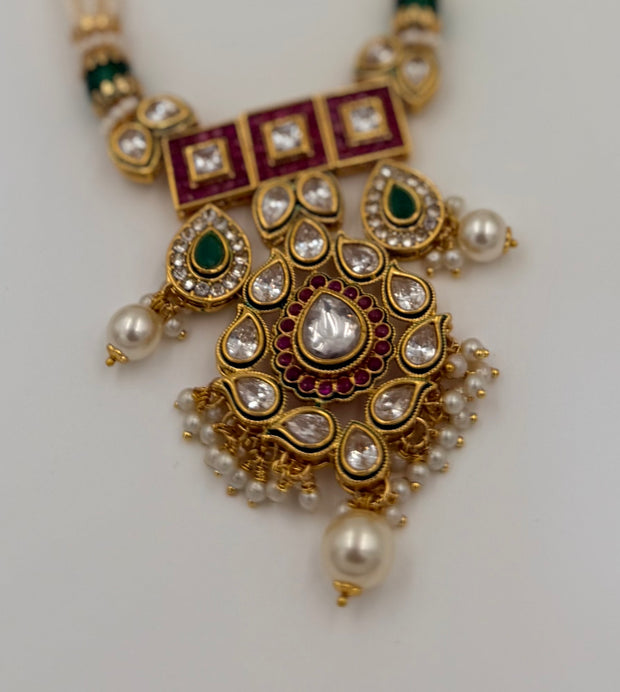 Kundan Pearl Necklace Set with Green & Ruby Stones