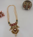 Kundan Pearl Necklace Set with Green & Ruby Stones
